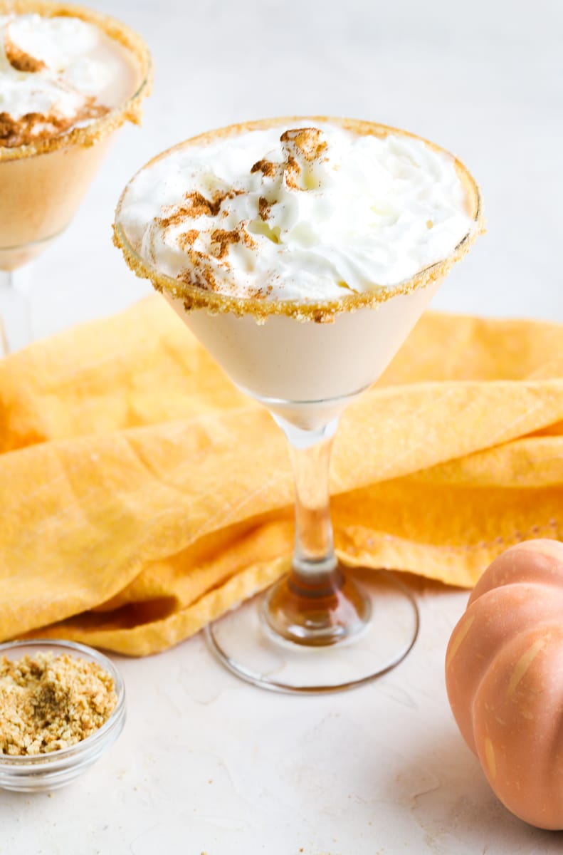 pumpkin martini with whipped cream on top